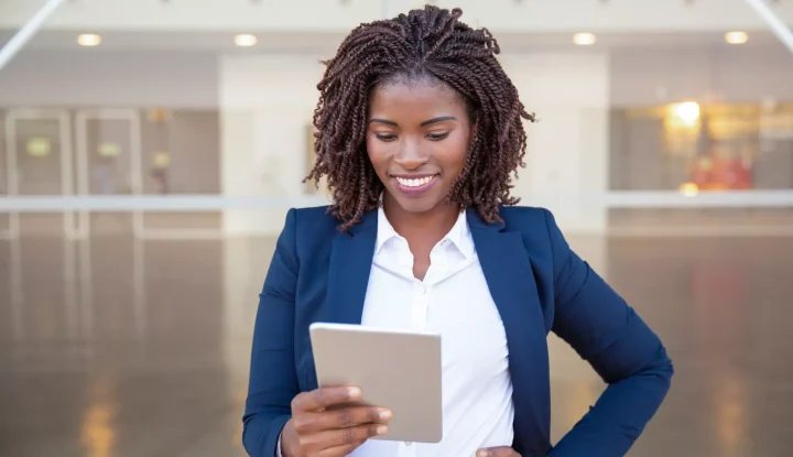 Latest News - Sabre Hospitality - Image of woman using iPad.